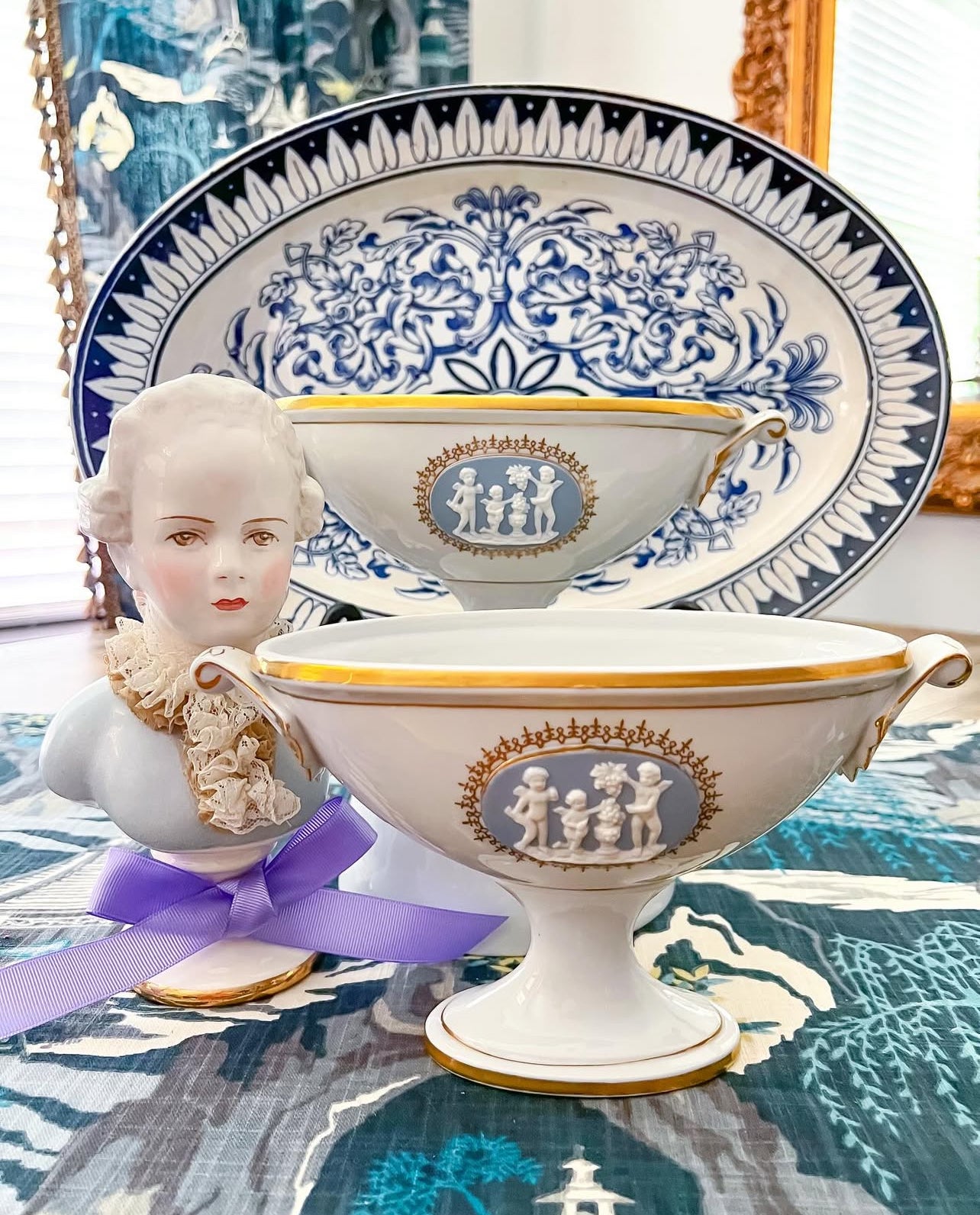 Vintage porcelain and jasperware urn pair