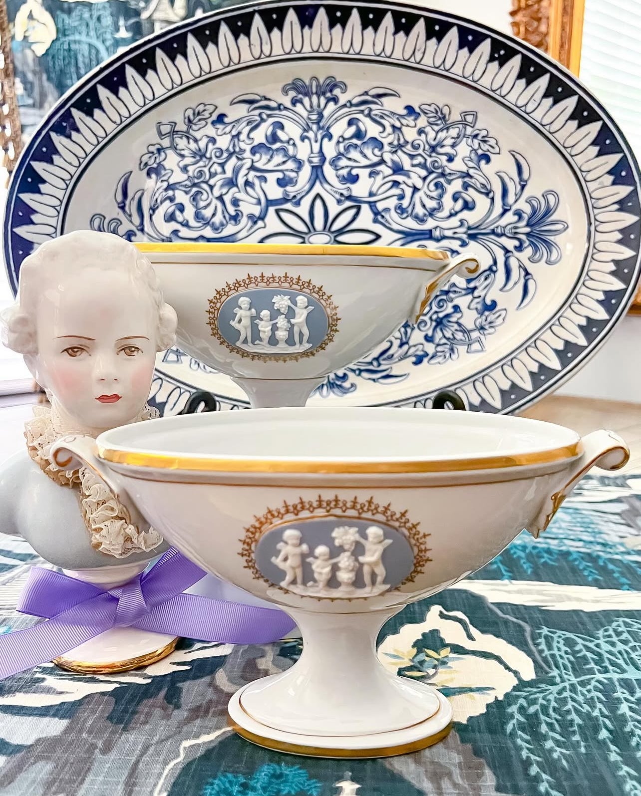 Vintage porcelain and jasperware urn pair