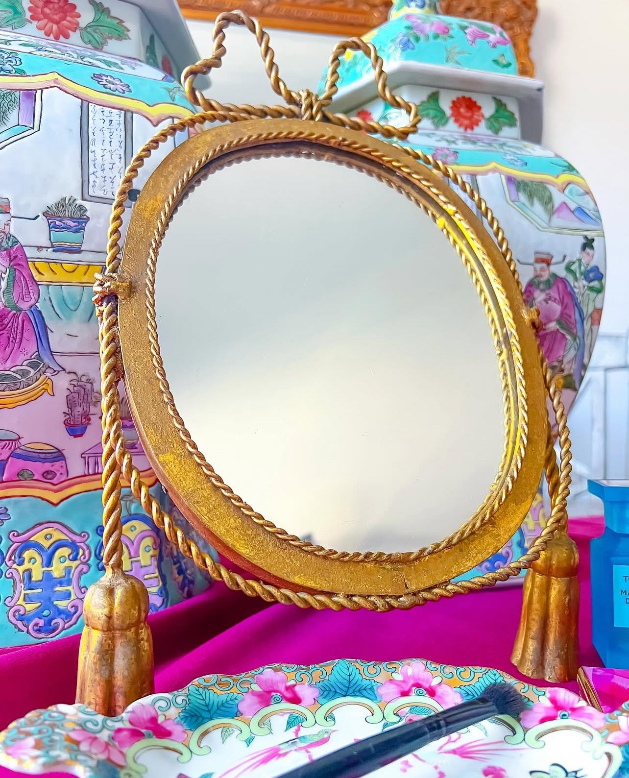 Vintage bow and tassel mirror