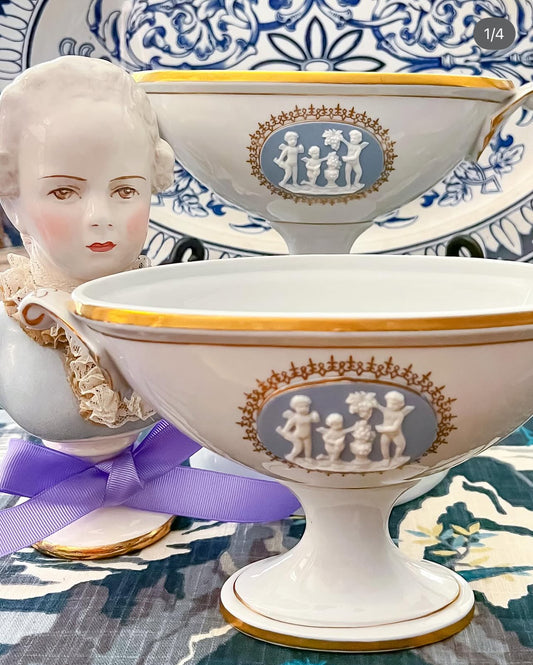 Vintage porcelain and jasperware urn pair